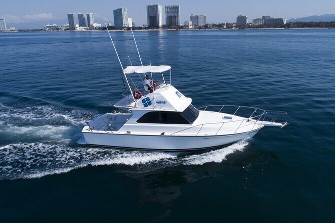 Bertram 38' Convertible Boat in Puerto & Nuevo Vallarta - Stop 1: Puerto Vallarta Shoreline Sightseeing From the Bay