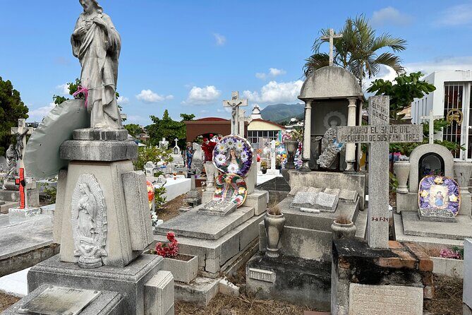 Day of the Dead inspired Cemetery Tour in Puerto Vallarta - Stop 1: Puerto Vallarta’s oldest cemetery, old market streets, murals, and a death cult shrine