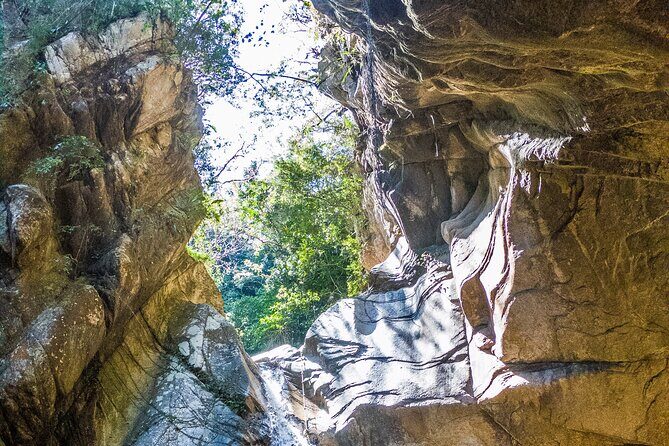 Hiking Adventure: River Trails & Waterfall Wonders - The hiking pace: guided, small-group, and wet-terrain friendly