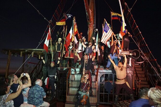 Incredible Nightly Pirate Show in the Bay of Puerto Vallarta - Entering the Night: Meeting on the Marina Side