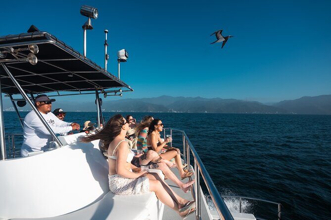 Private Yacht Charter Chica Fun 6 waterslides in Puerto Vallarta - Crew, Guides, and the Onboard Photo Option