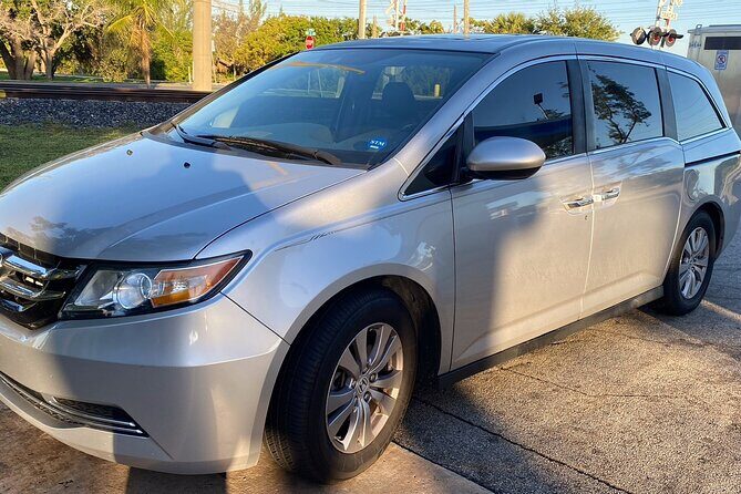 Puerto Vallarta Airport (PVR) to Punta de Mita hotels - Private Arrival Transfer - Where the Driver Meets You: Arrival Hall, Name Sign, and a Corona Bar Clue