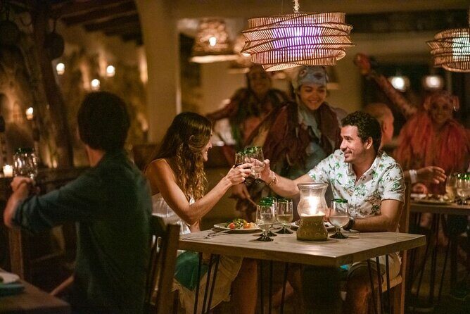 Show Evening Rhythms, Dinner Buffet, Boat Trip - Classic - Stop 2: Las Caletas at dusk—candles, drums, and a story with stakes