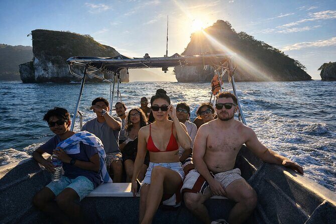 Sunset Boat Tour & Bioluminescence Adventure at Los Arcos Islands - Playa Mismaloya: start with a beach drink and the right mood