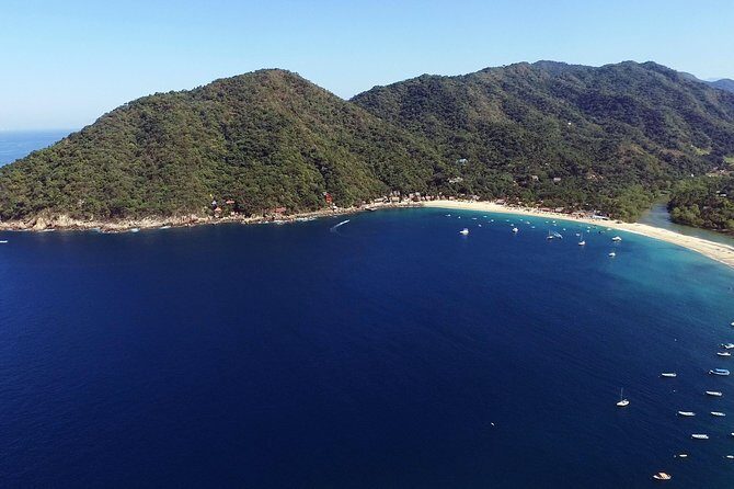 Yelapa and Majahuitas Snorkeling Cruise in Puerto Vallarta All Inclusive - Crew energy, entertainment, and guide names you might hear